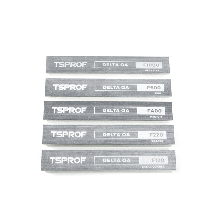 Set of TSPROF Delta OA sharpening stones with different grits on a white background