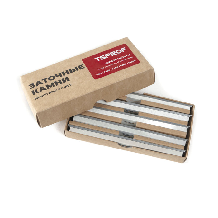Box of TSPROF sharpening stones with a cardboard box on a white background